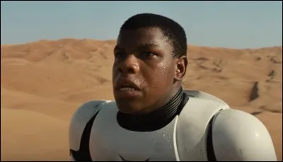 At the beginning of the story, with whom does Finn escape the First Order?