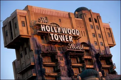 You are in front of a scary attraction in Disneyland, for example, the Tower of Terror, the staff makes you scare...