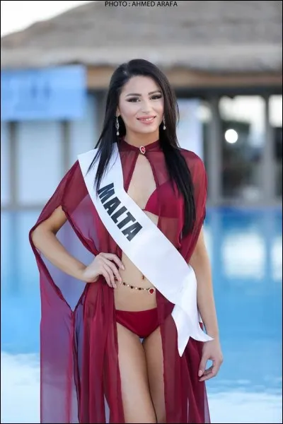 Who is this candidate, and which country does she represent ?