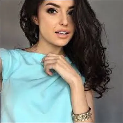 Who is this candidate and which country is she representing ?