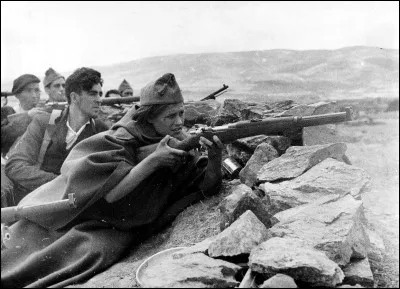 During the Civil War, Spain was divided into :