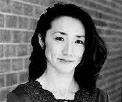 Who was elected as the most beautiful woman on Japan in 1987 ?