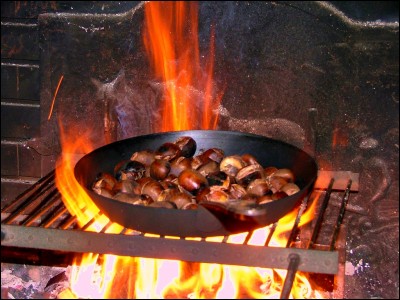 What is the biggest risk of roasting chestnuts on an open fire?