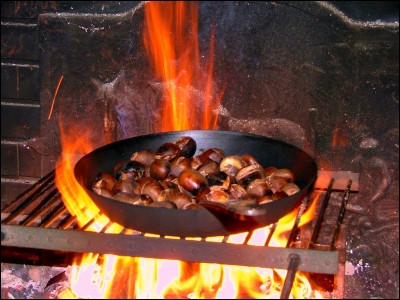 What is the biggest risk of roasting chestnuts on an open fire?