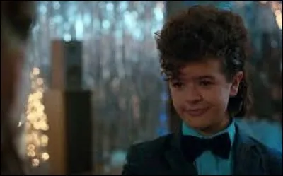 Who does Dustin dance with at the Winter Ball?