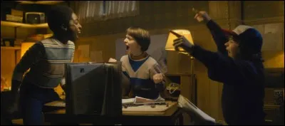 What's the name of the game Mike, Will, Lucas and Dustin love so much?