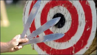 The main character is a master of knife throwing.