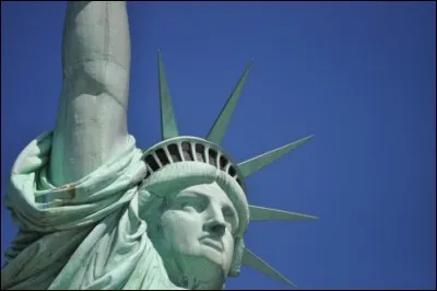 What does she hold in her other hand?