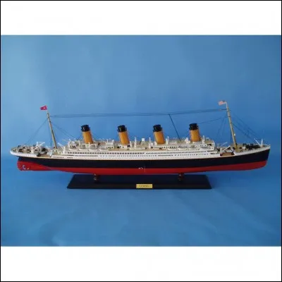 How many of the Titanic's compartments were opened to the sea after the collision with the iceberg?