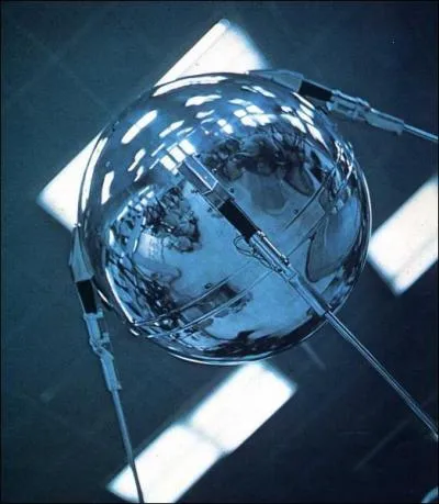 What was the name of the first satellite launched by man around the Earth?