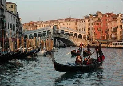 What is the name of this Venetian boat with a standing oarsman?
