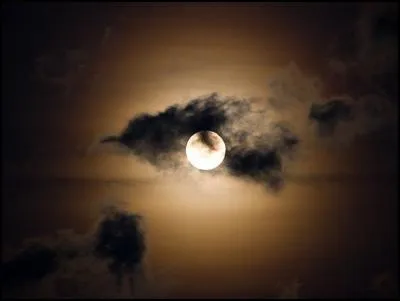 The moon shines because it is ...