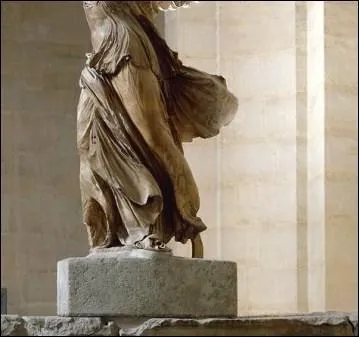 The statue of the Victory of Samothrace, of which only the legs are shown here, ...