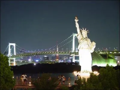 What does the Statue of Liberty illuminate?