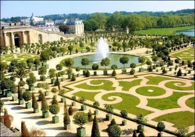 Who designed the gardens of Versailles?