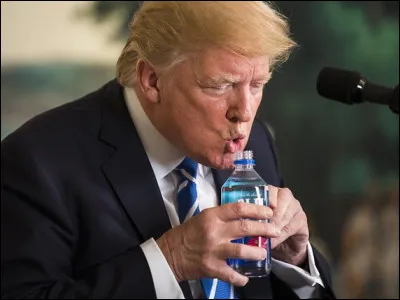 Donald dips his lips in water and drinks the competition. What is the symbol for water?