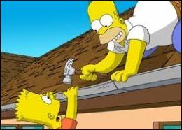 What part of the body does Homer injure himself with a hammer while trying to repair the roof of his house ?