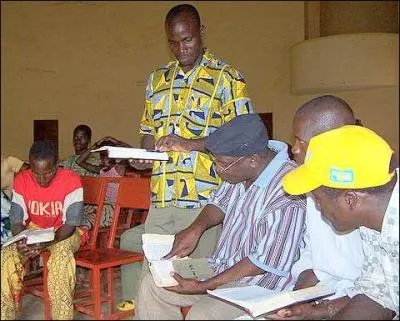 How many different languages are spoken in Benin?