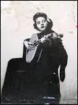 A Portuguese singer, she makes Fado known and appreciated on stages the world over.