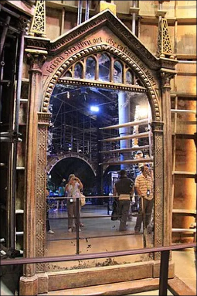 In which room does Hagrid pick up a mysterious package at Gringotts?