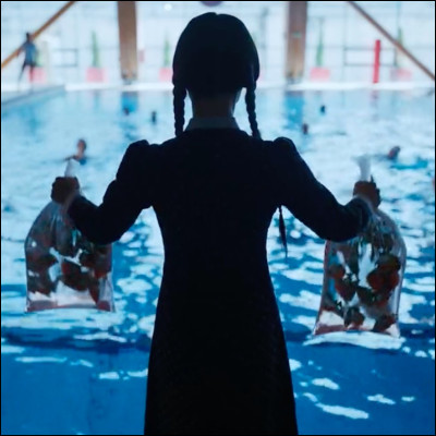 Why wednesday throws piranhas in the pool?