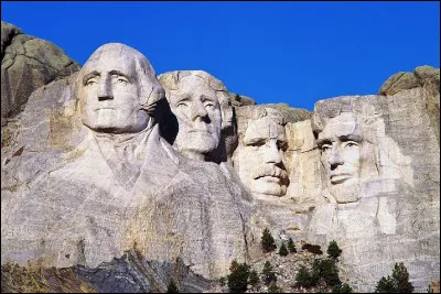 Which American president is not represented on the Rushmore Bridge sculpture?