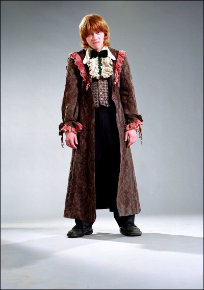 4th place: What does Ron receive from his mother for the Christmas ball in his fourth year?