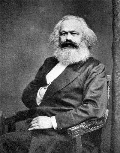 What did Marx call the transitional phase between capitalism and communism?