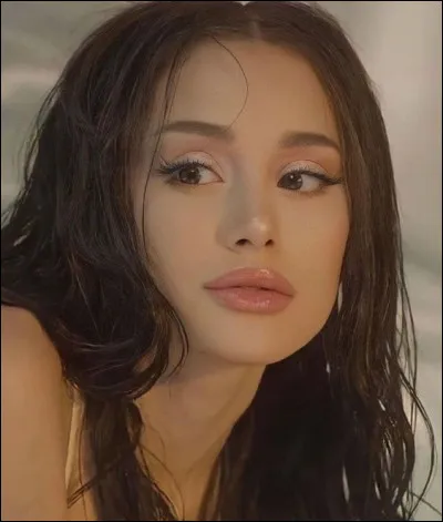 At what age did she sing for the first time in front of milions of people?