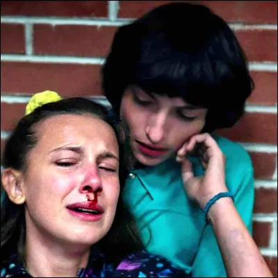 When do Mike and Eleven kiss for the first time?