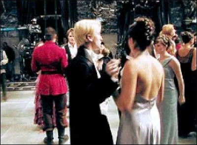 Who is she going to the Christmas ball with?