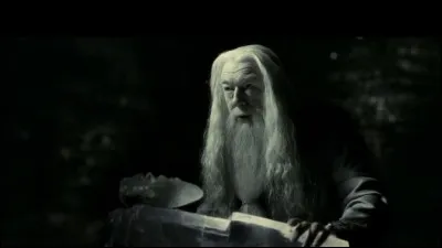 Which horcrux found by Dumbledore blackened his hand?