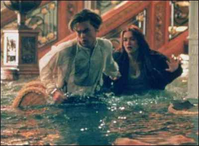 How does Rose warn the lifeboat?