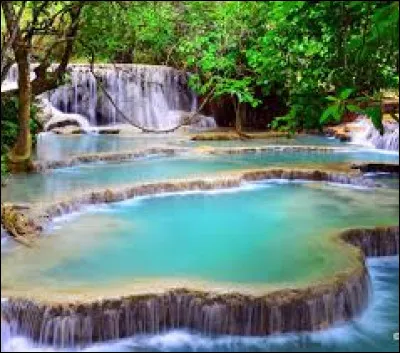 Where are the Kuang Si waterfalls located?