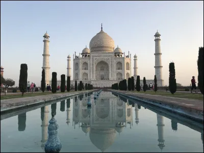 The Taj Mahal, a white marble mausoleum built by Emperor Shah Jahan in memory of his wife Arjumand Banu Begam.