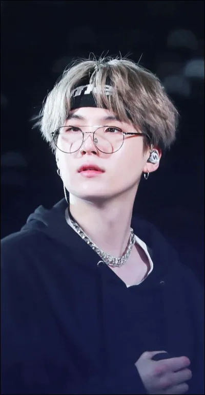 What was the first album that Suga buy with his own money ?