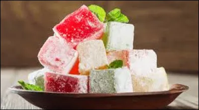 Lukoum is a confection made from wheat starch and flavored sugar, sprinkled with powdered sugar.