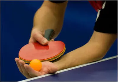 In table tennis, how many points must a player reach to win a set?