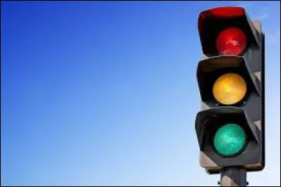 In this traffic light, what does green mean?