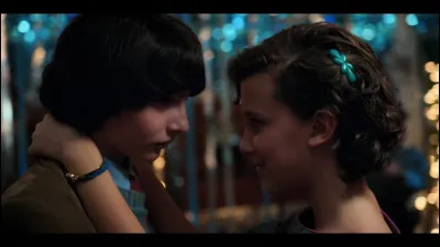 Who does Max dance with at the Winter Ball?