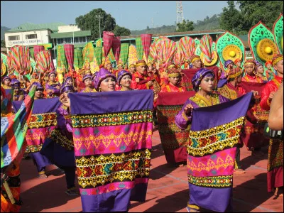 Which city celebrates the Tnalak Festival?