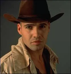 What's the name of the tenebrous literature professor she falls in love with?