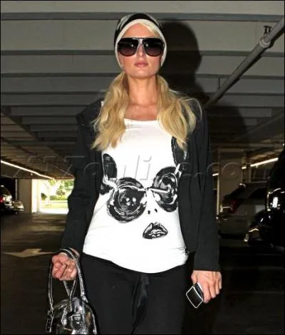Paris Hilton is wearing... .