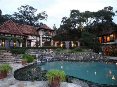 Whose home is located in Bellair? This home has multiple fireplaces, a glass-enclosed spa and a pool. This home was originally listed for $25 million, it was reduced to $9. 242 million.