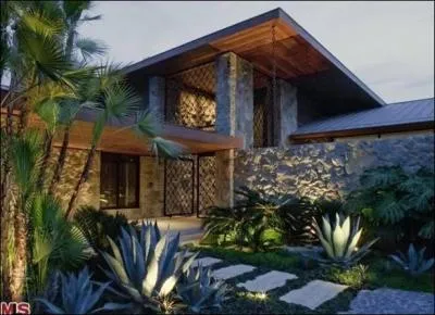 Whose home was meticulously remodeled? It is surrounded by lush gardens, tranquil water features and stunning urban scenery. This home is on the market for $42 million.