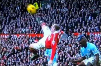 Which English player performed a magnificent acrobatic turn against Manchester City?