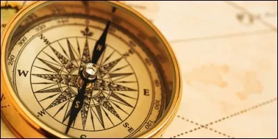 Which direction does a compass needle point?