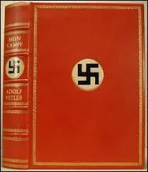 What is the title of the autobiographical work written in prison that sets forth the basis of his ideology?