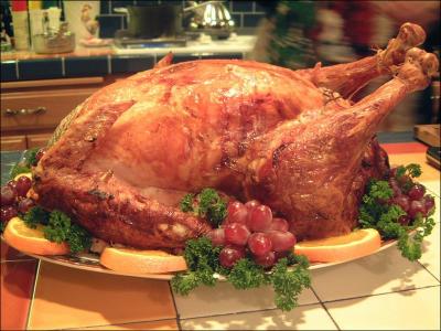 What main precaution should you take when carving a turkey at Christmas?