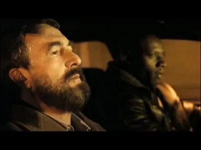 During the car ride, what does Driss bet Philippe?